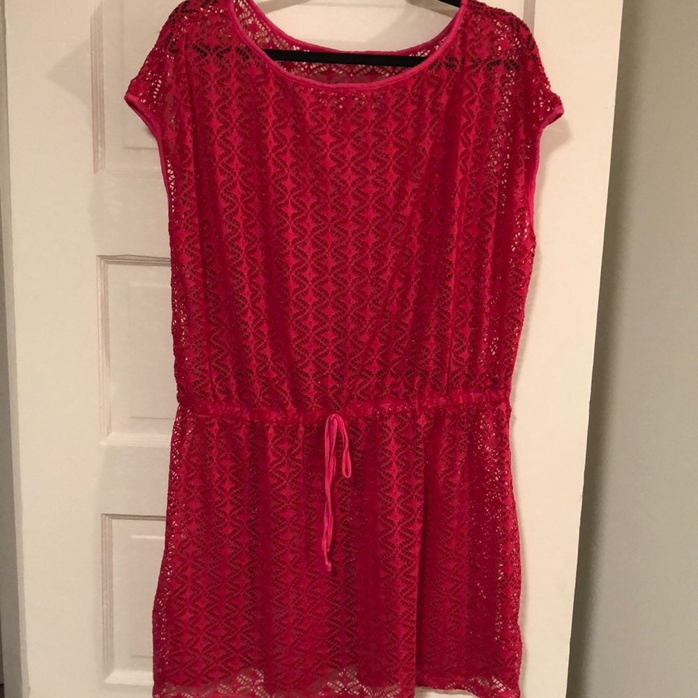 Never worn pink swimsuit coverup. Size XL. Runs big.